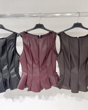 0499950 Blusa peplum polipiel Zara